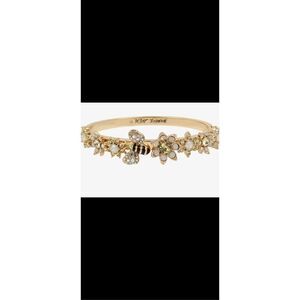 Betsey Johnson bumblebee gold hinged bracelet with embellished ￼flowers and an a